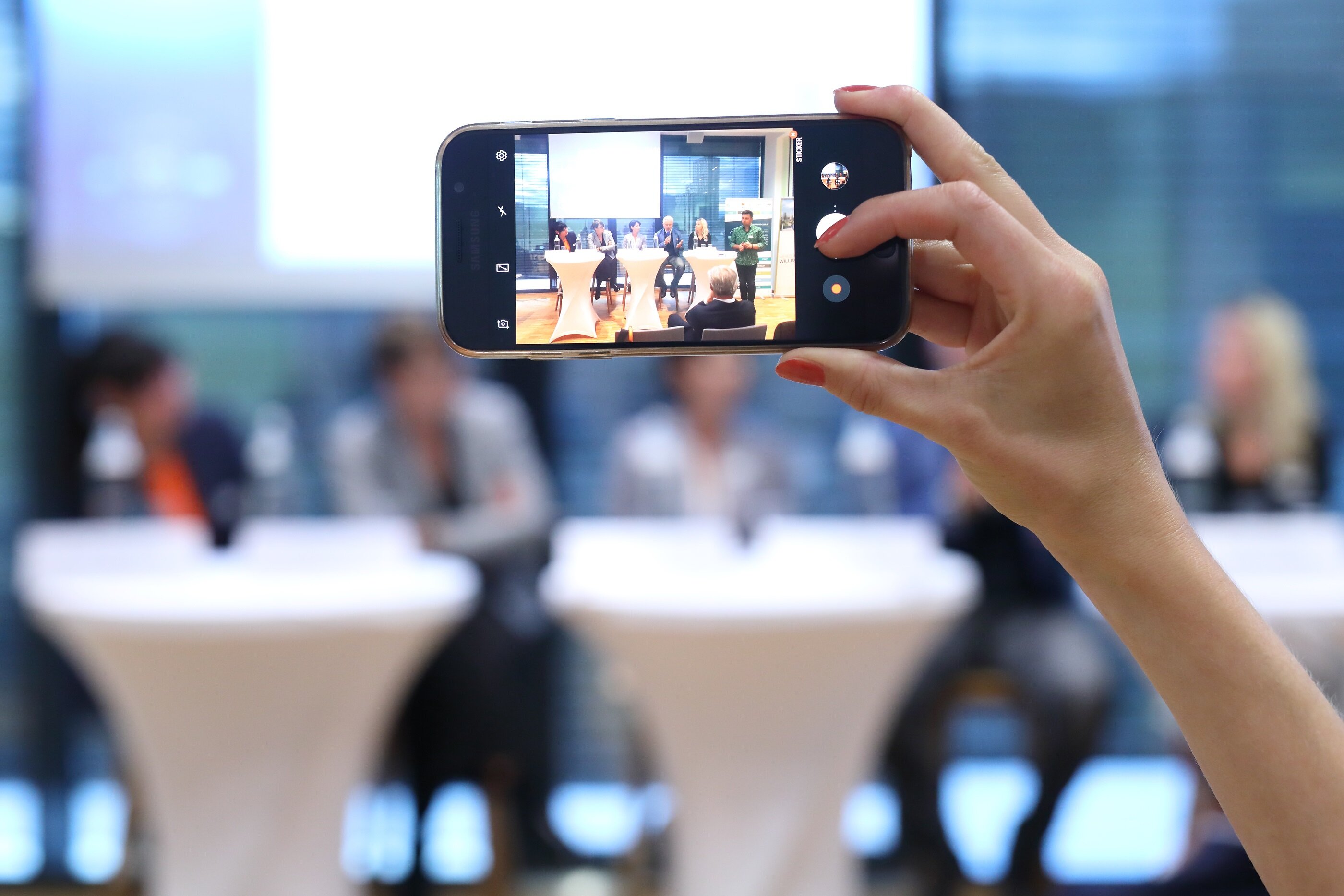 Podiumsdiskussion, Handy-Foto